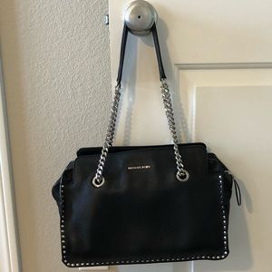 Black Michael Kors handbag.
